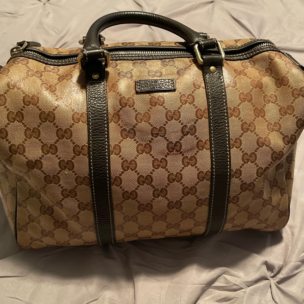 Gucci Crystal Monogram Joy bag with Leather.   I’m used condition